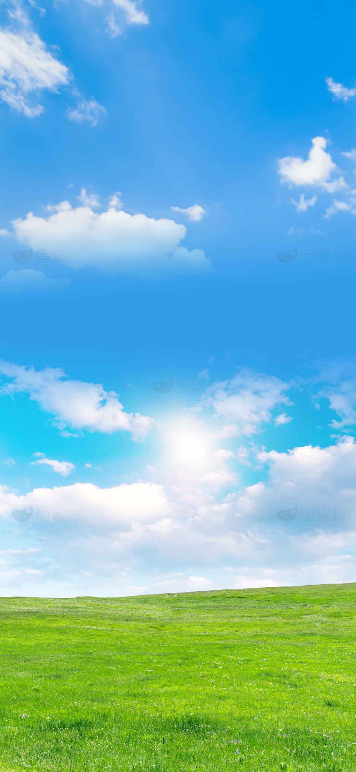 蓝天白云与绿色草地的自然风光素材